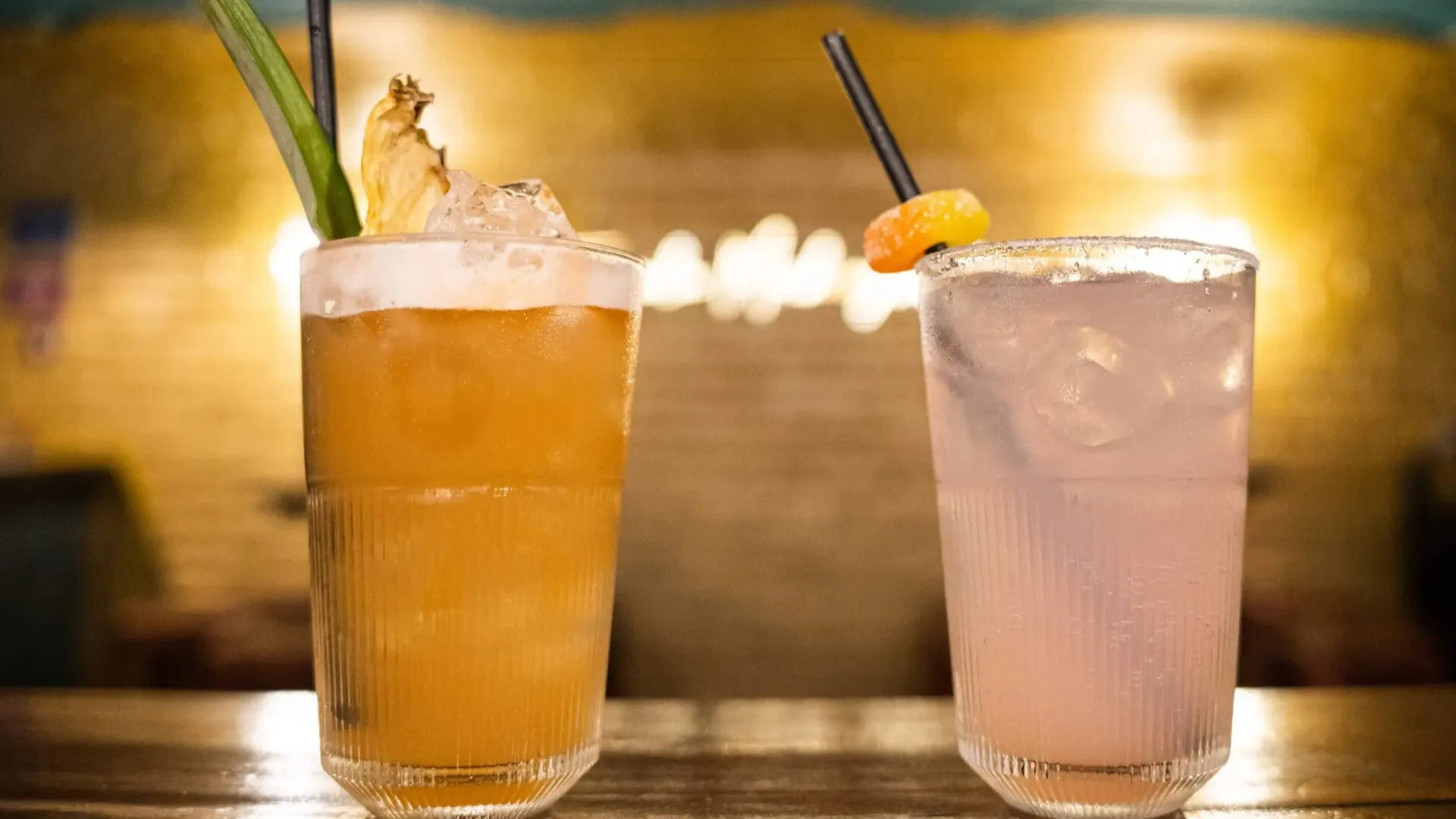 Cocktails with neon lighting in the background